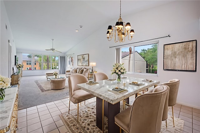 4130 Looking Glass Ln Unit 3802, Naples, FL 34112 - carpeted dining area featuring tile patterned floors, a chandelier, a ceiling fan, and high vaulted ceiling