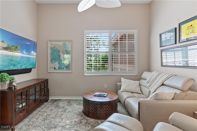 living room with ceiling fan