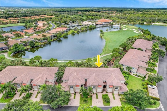 bird's eye view with a water view