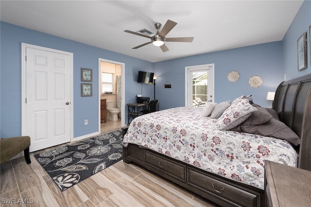 bedroom with ceiling fan, light hardwood / wood-style floors, ensuite bathroom, and access to outside