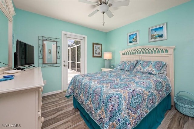 bedroom with ceiling fan, access to outside, and light wood-type flooring