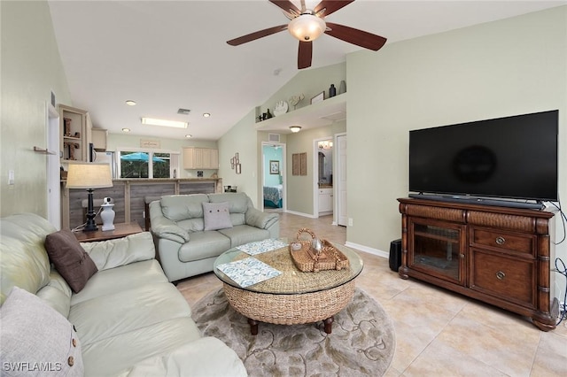 tiled living room with high vaulted ceiling and ceiling fan