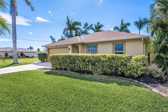 single story home featuring a garage and a front yard