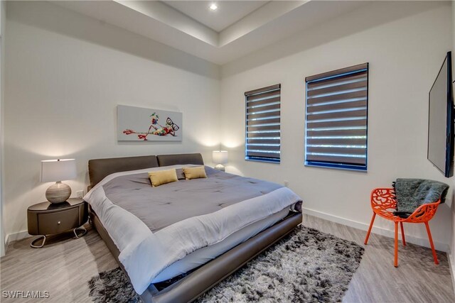 bedroom featuring light hardwood / wood-style floors