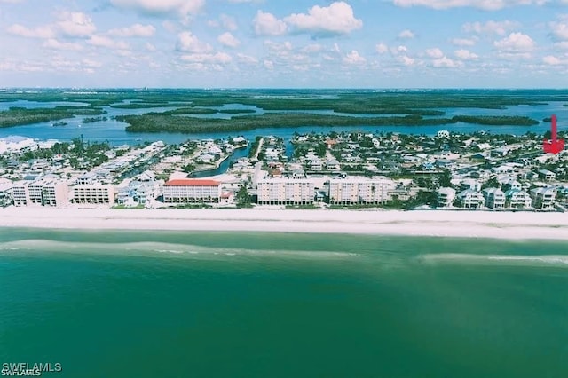 aerial view with a view of the beach and a water view