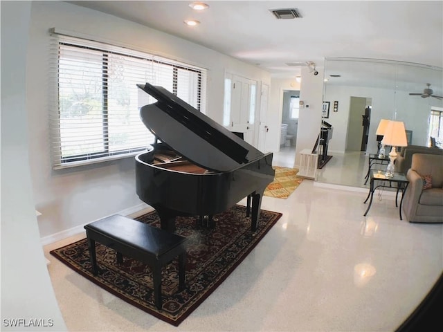 miscellaneous room with ceiling fan