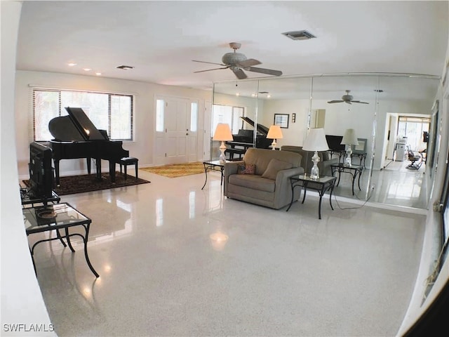 living room with ceiling fan