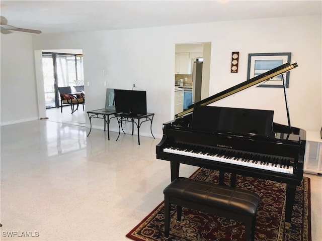 misc room with ceiling fan