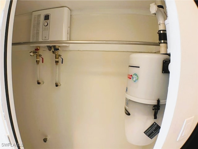 utility room with water heater