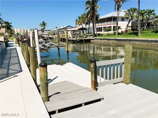 view of dock with a water view