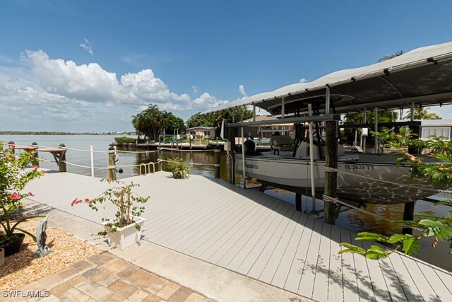 dock area featuring a water view