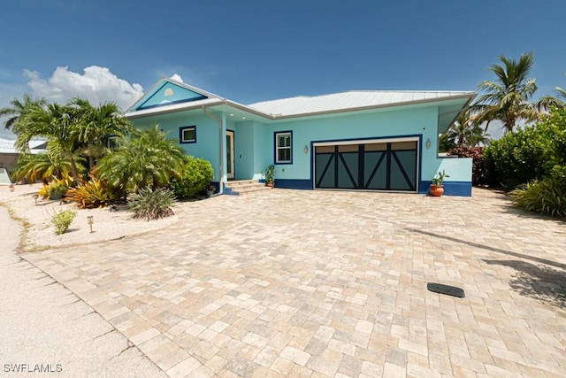 view of front of home featuring a garage