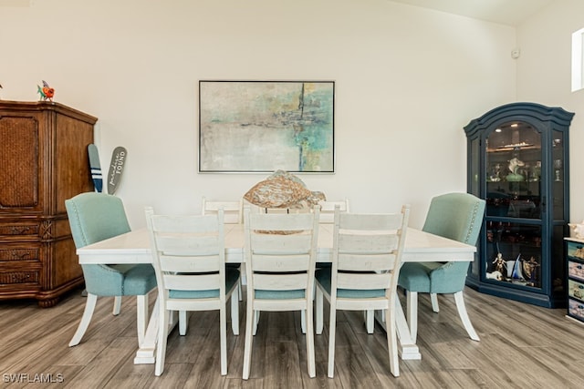 dining area with wood-type flooring