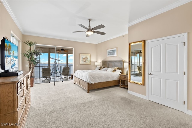 carpeted bedroom featuring access to outside, ceiling fan, and crown molding