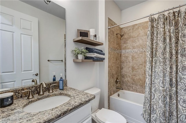 bathroom featuring toilet, vanity, and shower / bathtub combination with curtain