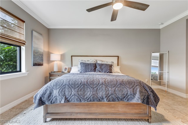 tiled bedroom with ceiling fan, baseboards, and ornamental molding