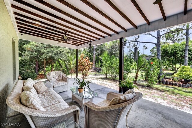 view of patio featuring ceiling fan and outdoor lounge area