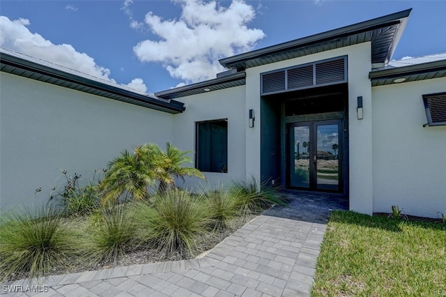 view of exterior entry with french doors