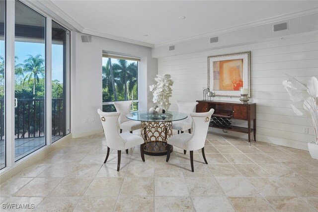 dining room with crown molding