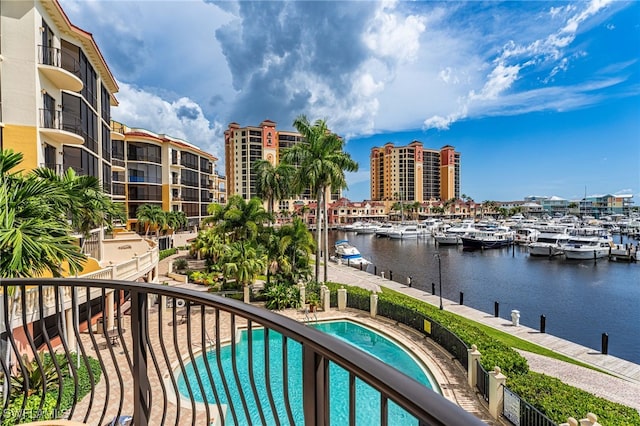 balcony featuring a water view