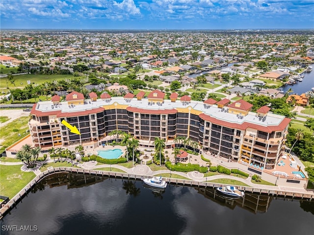 bird's eye view with a water view