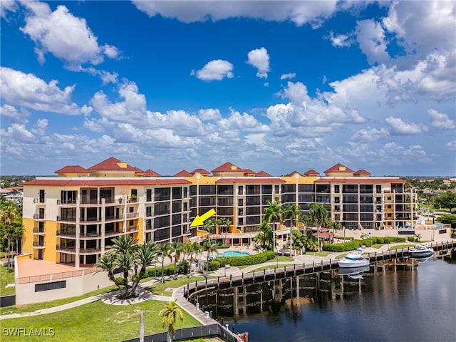 view of building exterior with a water view