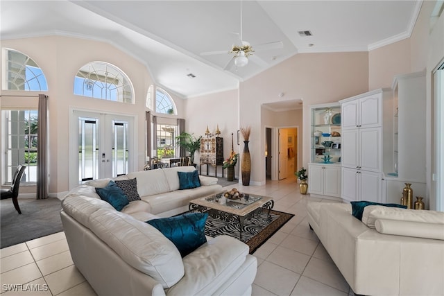 living room featuring french doors, high vaulted ceiling, and light tile patterned floors