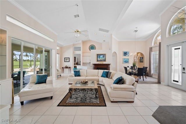 living room with light tile patterned floors, crown molding, and high vaulted ceiling