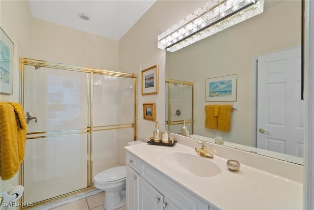 bathroom featuring an enclosed shower, vanity, tile patterned flooring, and toilet