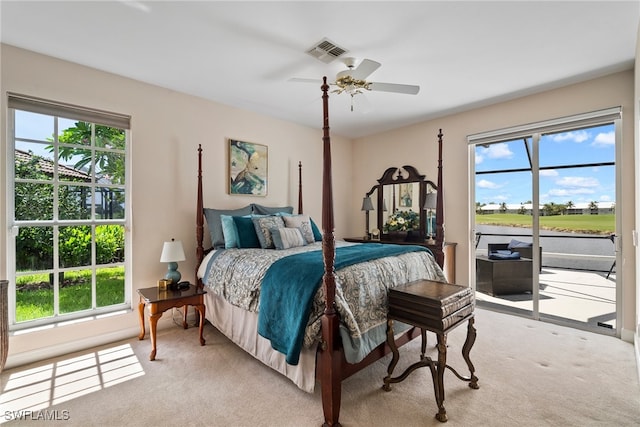 carpeted bedroom featuring access to outside and ceiling fan