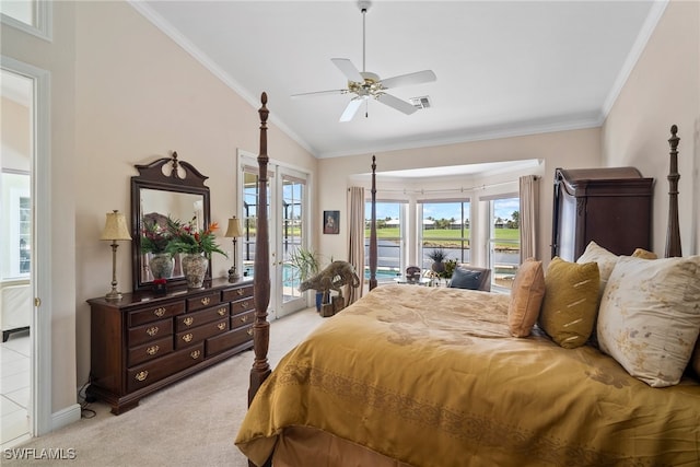 carpeted bedroom with multiple windows, ornamental molding, and access to exterior