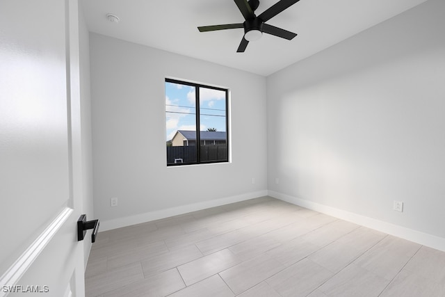 empty room featuring ceiling fan