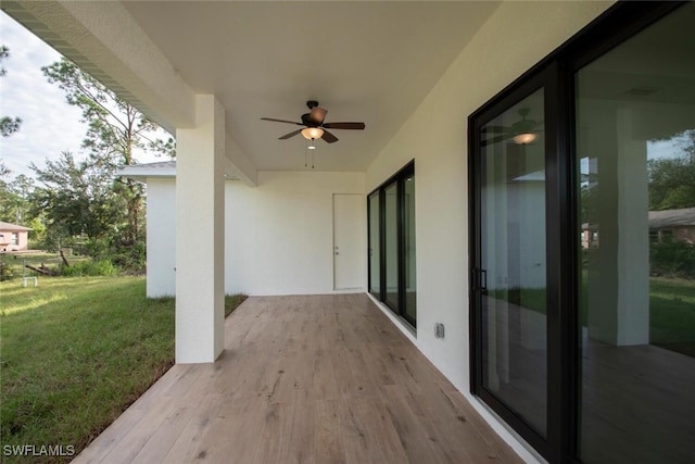 view of patio with ceiling fan