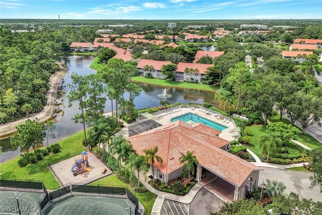 birds eye view of property featuring a water view