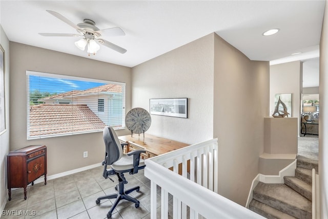 home office featuring ceiling fan and light tile patterned floors