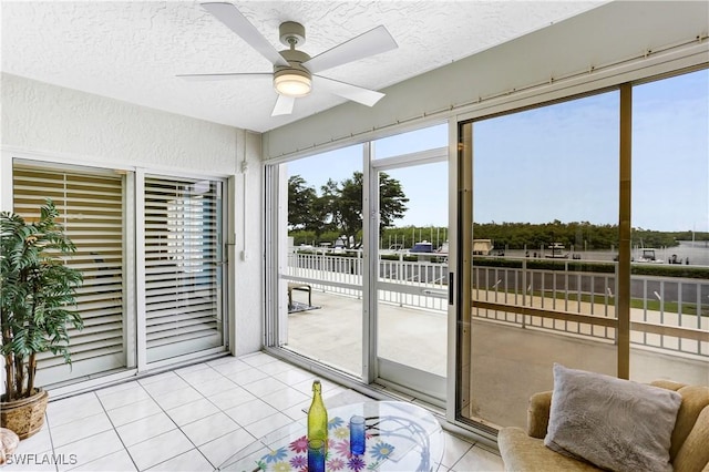 sunroom / solarium with ceiling fan