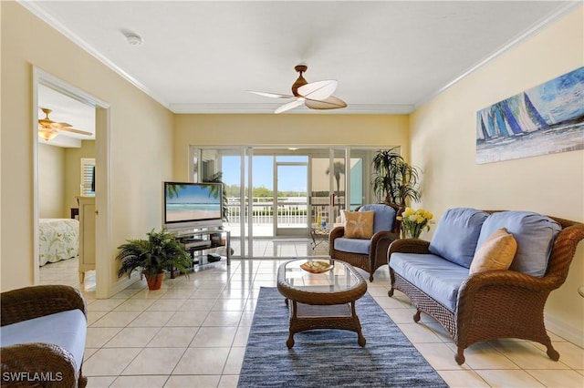 living area with light tile patterned floors, ornamental molding, and a ceiling fan