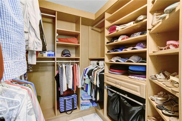 walk in closet featuring light tile patterned floors