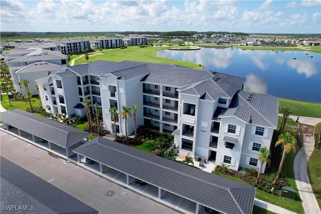 drone / aerial view featuring a water view