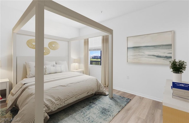 bedroom featuring light wood-type flooring