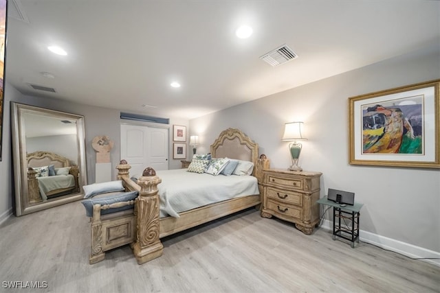 bedroom featuring light hardwood / wood-style floors