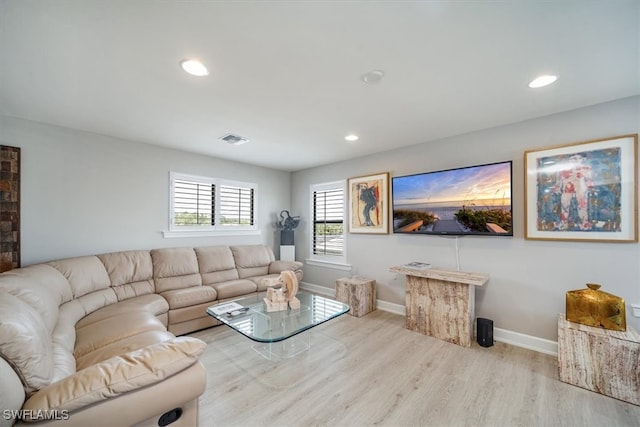 living room featuring light wood-type flooring