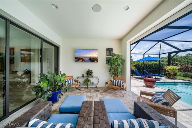 view of patio / terrace featuring glass enclosure