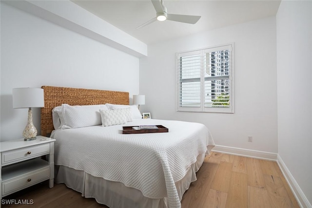 bedroom featuring ceiling fan and light hardwood / wood-style floors