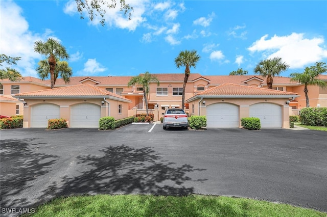 mediterranean / spanish-style house featuring a garage