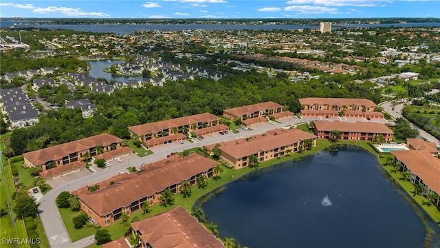 aerial view with a residential view and a water view