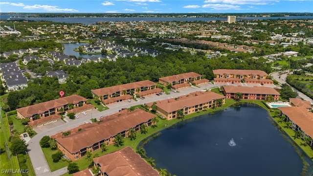 aerial view featuring a water view and a residential view