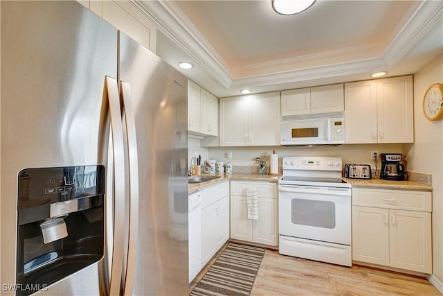 kitchen featuring white cabinetry, light hardwood / wood-style floors, white appliances, and crown molding