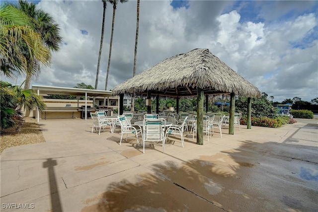 view of community featuring a gazebo and a patio area