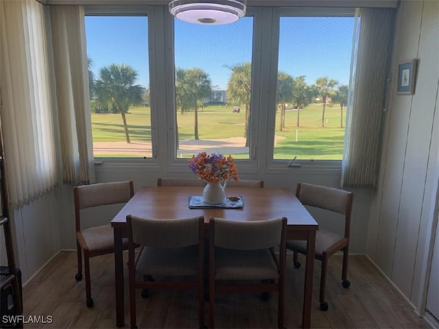 dining area featuring hardwood / wood-style flooring